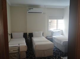 مكة المكرمة غرف عائلية فندق بجوار الحرم تخفيضات للمجموعات ناحية برج الساعة Makkah room in HOTEL near ALHARAM Multiple ROOM，位于An Naqāʼ的旅馆