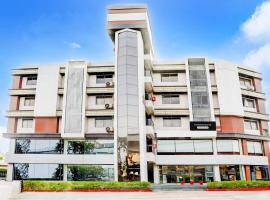 Super Townhouse Prahladnagar formerly Metro Inn，位于Sarkhej的酒店