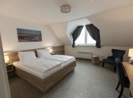 Cuxlandhotel Doppelzimmer 119，位于多鲁姆纽菲尔德的酒店
