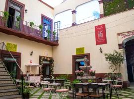 Quinta Alhóndiga Galindo Hotel Boutique，位于乔卢拉的酒店