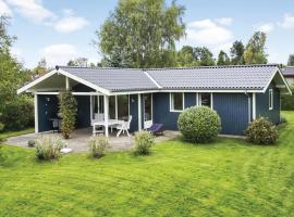 Four-Bedroom Holiday Home In Dronningmolle，位于德隆宁莫勒的酒店