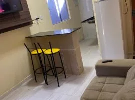 Flats com ar condicionado, garagem e internet