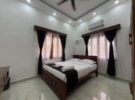 Hexahub Homestay and Hospitality Services，位于蒂鲁奇奇拉帕利的酒店