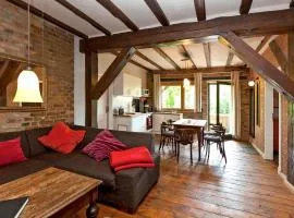 Ferienwohnung Lilie mit Balkon in einer geschmackvoll sanierten Backsteinmühle