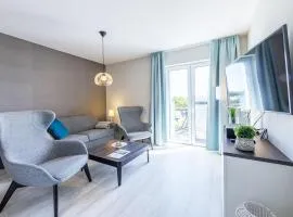 Boddenperle - 5-Sterne-Ferienwohnung mit Ostbalkon, 2 Bädern & Strandhaus-Charme