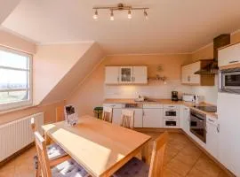 Storchenflug - Dachgeschosswohnung mit Kamin & Balkon am Fleesensee