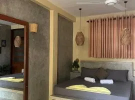 Sandbank Madiha deluxe bedroom with private bathroom