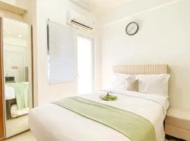 Studio Green Pramuka City Apartment with Mall Access By Travelio