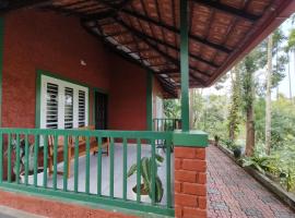 Paddy Villa Home Stay Near Kuruva Island Near Kabani Safari Centre Nagarhole wild life Thirunelly and Thrissilery Temple Banasura sagar dam 12 acra plantation private property Ac Villa trucking fishing campfire facility，位于玛纳多迪的酒店