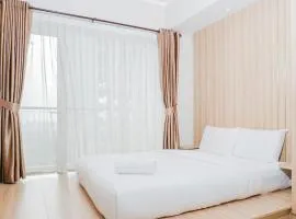 Clean and Elegant 1BR at The Oasis Apartment By Travelio