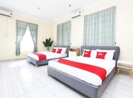 OYO 89607 Aloha Chalet，位于Kampung Raja的酒店