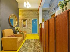 OYO 90720 Sky Garden Inn，位于Kampung Raja的酒店