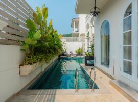 ELIVAAS 4 BHK Villa with Pvt Pool & Jacuzzi-Yashgeet，位于西奥利姆的酒店