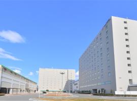 临空J酒店，位于Tokoname的海滩酒店