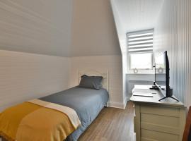 Chambre 302 de l'hôtel Victoria confortable et moderne，位于Saint-Pascal的酒店