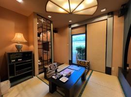 Hotel Karakonosato 唐比の里，位于谏早市的酒店