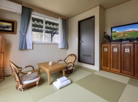 Shirokane Freeport Hotel - Vacation STAY 85764，位于上富良野町的酒店