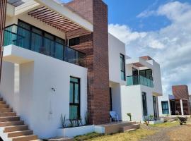 Cabañas Jardín del mar a solo pasos de la playa，位于圣贝尔纳多德尔比恩托的酒店