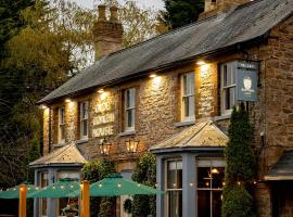The Olde Coach House Inn，位于阿什比圣勒杰斯的酒店