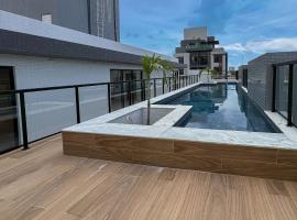 Lumiere Intermares Flats 300m Praia WiFi Piscina Rooftop By DM Apartments，位于卡贝德卢的酒店