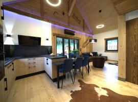 Chalet cosy & confort haut de gamme - Sauna, Spa, Clim，位于Anould的酒店