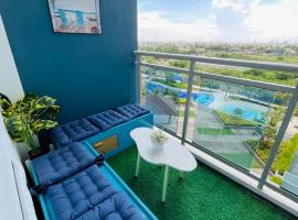 Beach Vibe Condo with PS4, Mini Karaoke, Board Games in Azure North San Fernando Pampanga，位于圣费尔南多的酒店