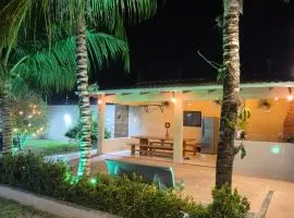 Casa com 01 ou 02 quartos com suite para hospedagem de até 04 pessoas