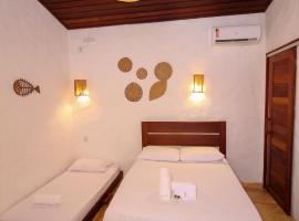 Palm Beach Pousada - Praia de Caetanos Quarto Casal ou Triplo，位于Amontada的酒店