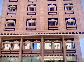 فندق حياة تاون ضبا，位于Ḑubā的带停车场的酒店