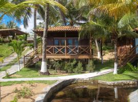 Pousada Palm Beach Praia de Caetanos Chalé Família，位于Amontada的酒店