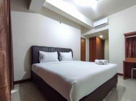 Big and Comfy 3BR at Vida View Apartement By Travelio，位于Pampang的酒店