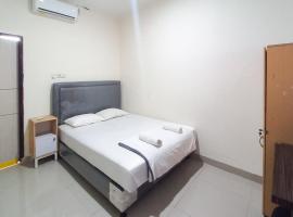 D Cost 19 Syariah Mitra RedDoorz，位于Palas的酒店