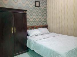 Trihakso Guest House near Kaliurang RedPartner，位于斯勒曼的酒店