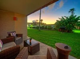 Beach Boardwalk Access Pool Remodeled Interior Tropical Haven by AvantStay