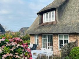 Hiidh&uuml;&uuml;s Wenningstedt unter Reet mit Sauna，位于文尼斯塔特的别墅