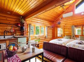 Log Cottage KUROITA，位于白马村的宠物友好酒店