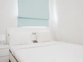 Cozy and Spacious 1BR Apartment at Parkland Avenue By Travelio