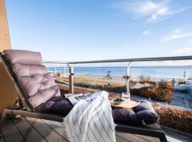 Büngers Apartment-Hotel mit Sommerstrandkorb & Gartensauna，位于施特兰德的酒店