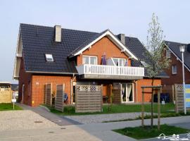 01 Sommerhus Esbjerg DHH mit Sauna und Whirlpool，位于伯格奥夫费马恩的带热水浴缸的酒店
