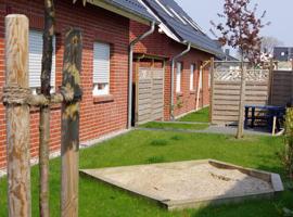 01 Sommerhus Femø Wellness EG An der Reiterkoppel 3a，位于伯格奥夫费马恩的酒店