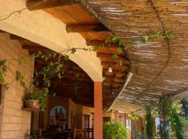 Hotel SPA Campestre Los Adobes，位于塔斯科·德·阿拉尔孔的酒店