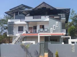 Aroha Homes Coorg，位于马迪凯里的酒店