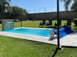 Casa de descanso alberca climatizada