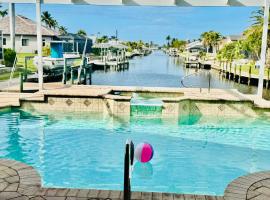 Waterfront Bliss Retreat Sailboat Access and Heated Pool，位于珊瑚角的酒店