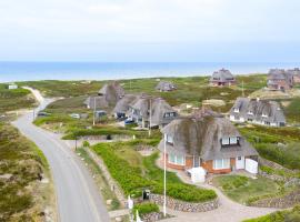Ferienhaus Seehaus Sylt - Urlaubszauber in den Dünen mit fantastischem Meerblick，位于兰图姆的酒店