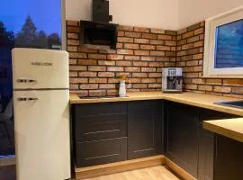 Domki trzy jeziora z zewnętrznym SPA - sauna, balia do schładzania i jacuzzi