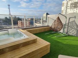 Apartamento Sofisticado Ed Del Paine terraço com hidro，位于卡庞达卡诺阿的酒店