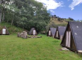 Glamping Hosteria Las Orquideas，位于巴尼奥斯的露营地