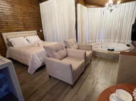 Pousada Alto Colina - Chalé Siriema，位于新文达移民镇的酒店