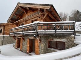 Chalet Niyama - Avec jacuzzi et station à pied，位于丰罗穆的酒店